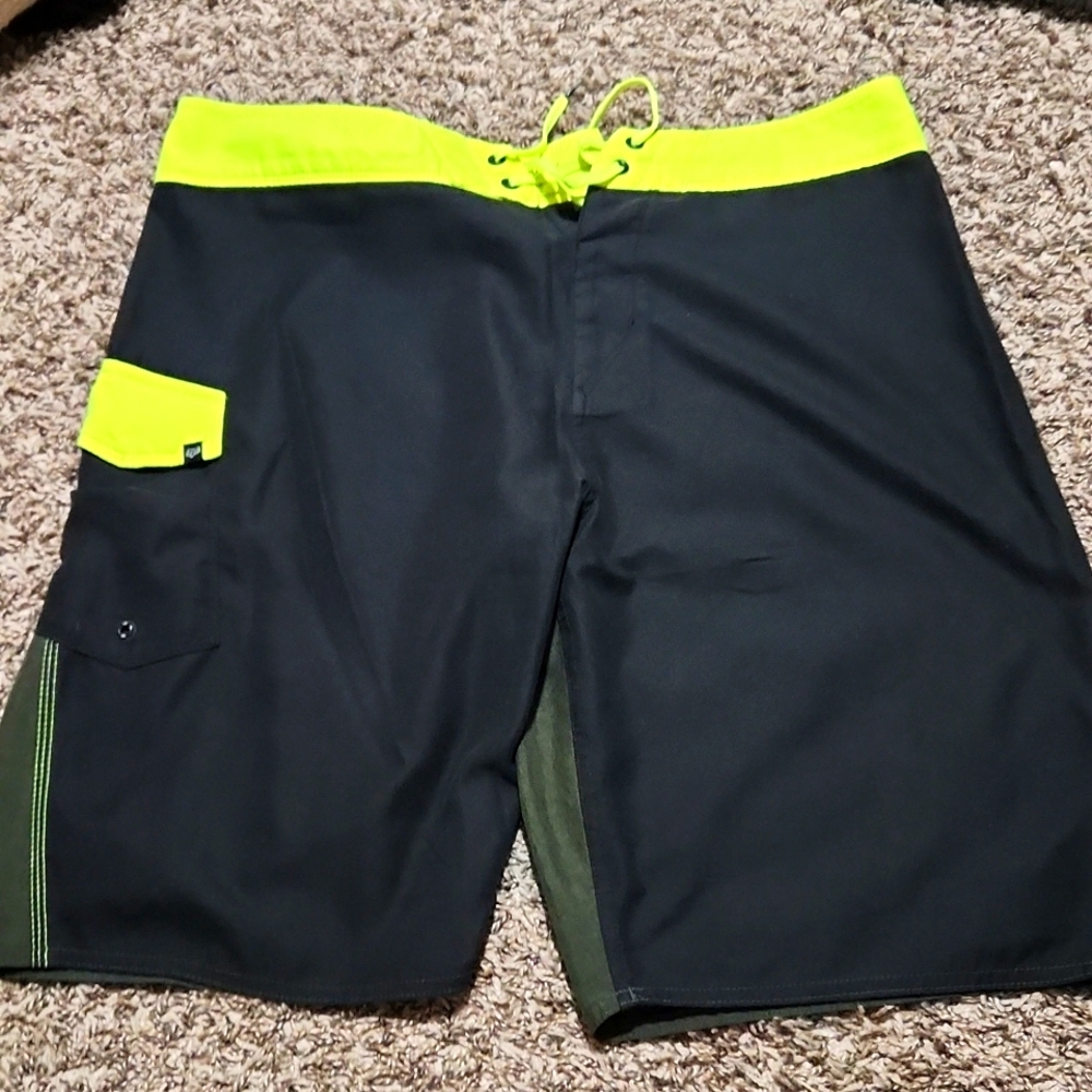 Mens FOX green swim shorts size 35